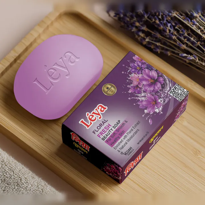 Léya Floral Fresh Beauty Soap bar and purple box on a bamboo tray