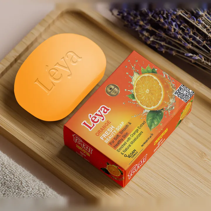 Léya Orange Fresh Beauty Soap bar and orange box on a bamboo tray
